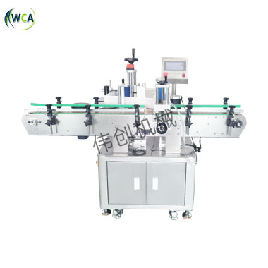 全自動圓瓶定位貼標機